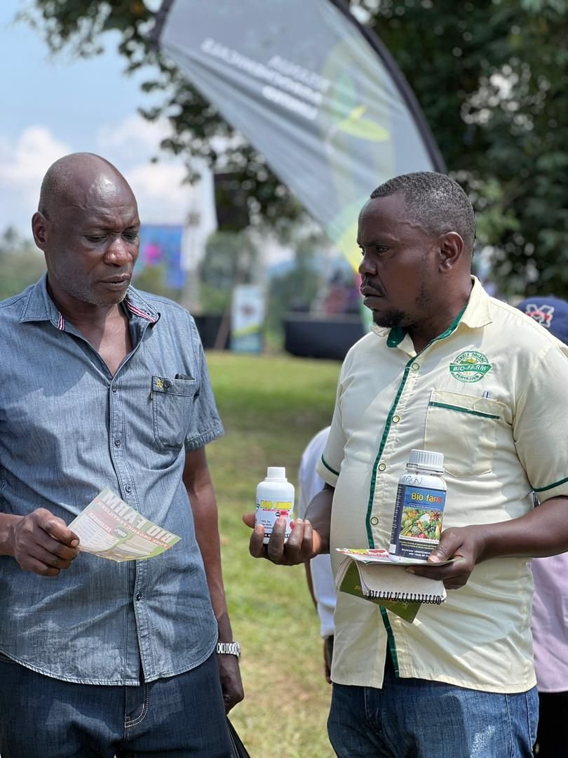 Bio-Farm product consultation with a farmer at an agricultural expo